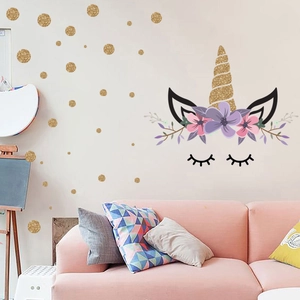 Golden unicorn wall decal with floral crown and polka dots for kids bedroom decor