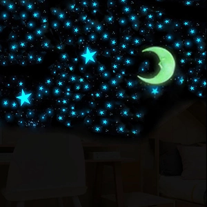 Luminous wall sticker set with glowing dark blue stars and moon for kids room decor