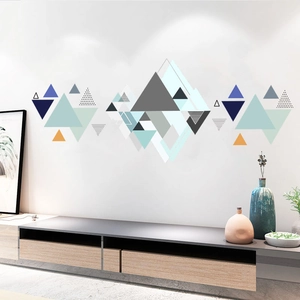Macro detail of geometric triangle wall decals with blue and grey mountain peak patterns