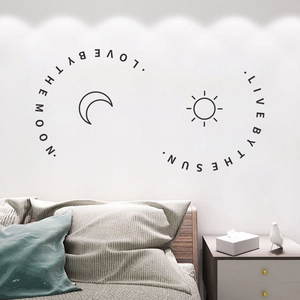 Minimalist sun and moon wall decals featuring Live by the Sun Love by the Moon quote