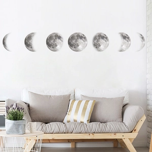 Modern lunar cycle wall decals featuring seven moon phases for minimalist living room decor