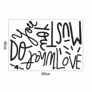 Detail view of 'Do what you love' wall sticker typography design with 60x40cm dimensions