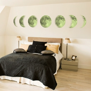 Luminous moon phase wall stickers for bedroom decor featuring seven glowing lunar cycle decals