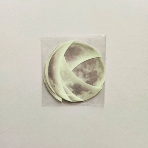 Detailed realistic moon phase wall stickers in glow in the dark green finish packaging