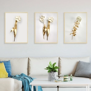 Three-piece set of Nordic modern golden floral wall art with light wood frames for home decor