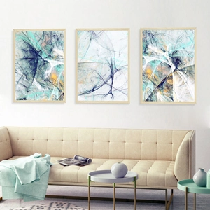 Modern abstract triptych wall art featuring fluid teal and orange patterns in light wood frames