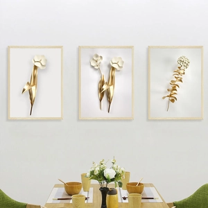 Three-piece Nordic wall art set with golden 3D flowers and light wood frames for home decor