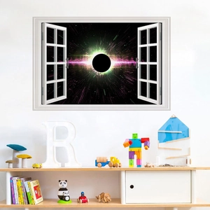 Dettaglio macro dell'adesivo murale 3D buco nero galassia su una parete bianca per bambini