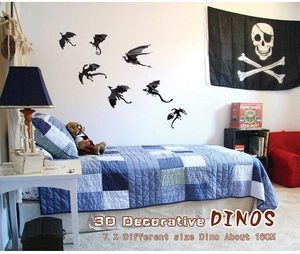 Detail showing set of 7 3D black PVC dinosaur wall decals in a child's bedroom setting