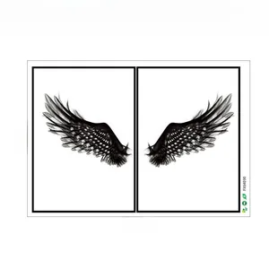 Detail of creative black wings wall sticker with A Broken Wing text 60cm x 40cm size