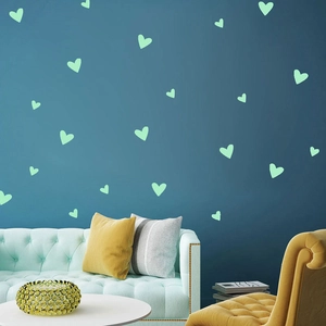 Luminous heart-shaped wall stickers in mint green for modern living room decoration