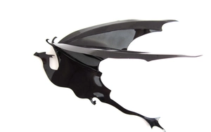 Detailed close-up of glossy black dragon wall sticker with high-shine acrylic finish
