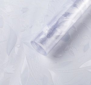 Detail of static cling glass film with 3D embossed floral patterns and tulip textures