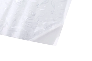 Detailed close-up of translucent tulip embossed window film with static cling texture