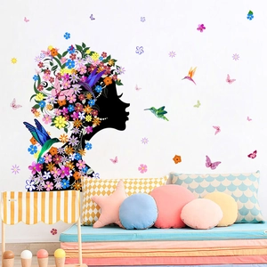 Adesivo murale silhouette ragazza con fiori colorati, farfalle e colibrì decorativi