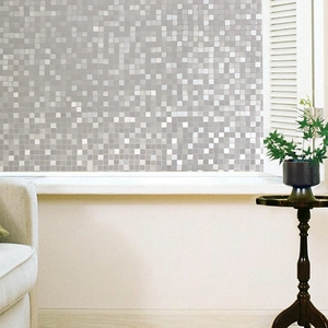 Detail of gray mosaic square pattern static window film for privacy and home decoration