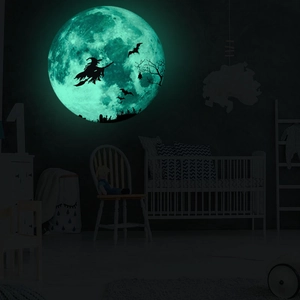 Luminous Halloween wall sticker featuring moon, witch on broom, and bats in green glow