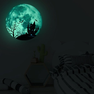 Luminous Halloween wall sticker showing a glowing moon with castle and bats silhouette