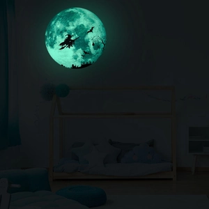 Luminous Halloween wall sticker featuring a witch silhouette on a bright green glowing moon