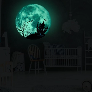Luminous Halloween wall sticker featuring moon with castle, bats, and pumpkin silhouette