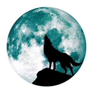 Detailed close-up of a luminous moon wall sticker with a black wolf silhouette howling