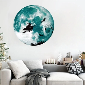 Luminous Halloween wall sticker featuring a moon, witch on broom, and bat silhouettes
