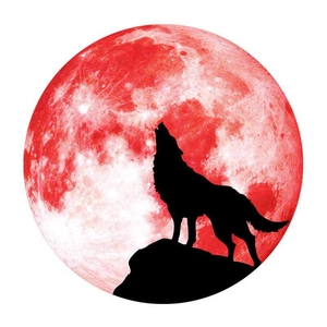 Glow in the dark wall sticker featuring a black wolf silhouette howling at a red full moon