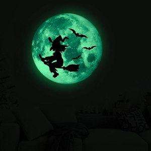 Luminous Halloween wall sticker featuring a glowing green moon with witch and bats silhouette