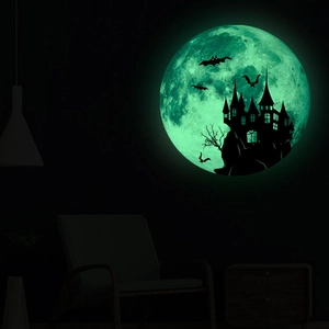 Luminous Halloween wall sticker featuring a glowing moon with castle and bats silhouettes