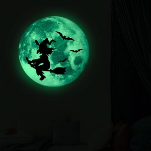 Luminous Halloween wall sticker showing a glowing moon with witch and bats silhouettes
