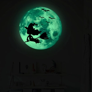 Luminous Halloween wall sticker featuring a witch silhouette on a glowing moon with bats