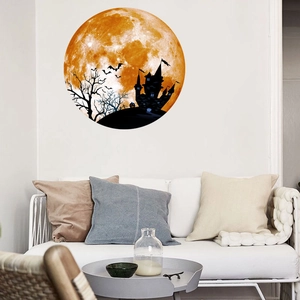 Luminous Halloween wall sticker showing a castle and bats silhouette against an orange moon