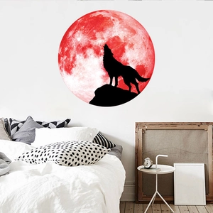 Luminous wall sticker featuring a howling wolf silhouette against a large red moon