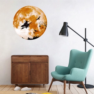 Luminous Halloween wall sticker featuring a witch silhouette flying over a bright orange moon