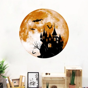 Luminous Halloween wall sticker featuring an orange moon with a black gothic castle and bats