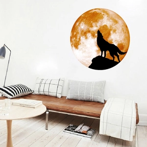 Detailed wall sticker showing a howling wolf silhouette against a large glowing moon
