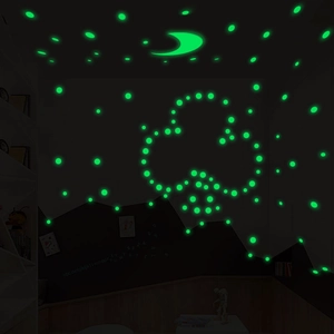 Luminous wall stickers set with moon and stars glowing in dark bedroom ceiling decor