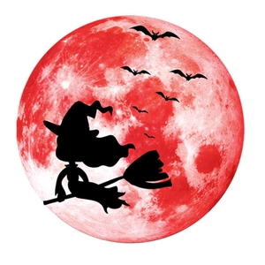 Macro detail of Halloween wall sticker featuring a witch silhouette over a red blood moon