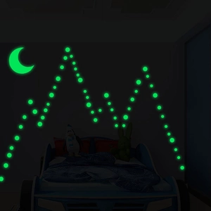 Luminous wall sticker set with glowing crescent moon and dots creating mountain shapes
