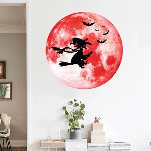 Luminous Halloween wall sticker featuring a red moon with flying witch and bat silhouettes