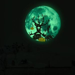 Luminous Halloween wall sticker featuring a moon silhouette with trees and pumpkins