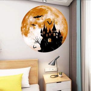 Luminous Halloween wall sticker featuring a gothic castle and bats against an orange moon