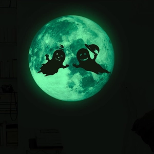 Luminous Halloween wall sticker featuring moon and glowing green ghost silhouettes