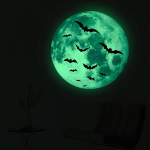Luminous Halloween wall decal set featuring a glow-in-the-dark moon and black bats