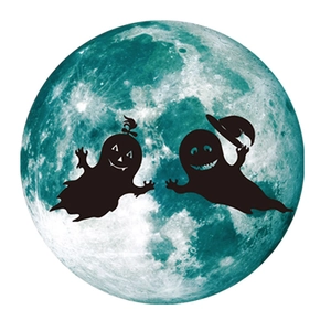 Macro detail of a luminous green moon wall sticker with cute ghost silhouettes for Halloween