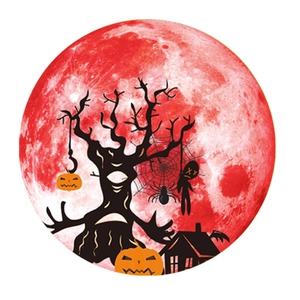 Close-up of Halloween moon wall sticker with silhouette of dead tree and spooky pumpkin