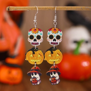 Detailed view of Halloween drop earrings featuring skull, pumpkin and ghost wood pendants
