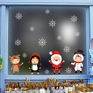 Detailed Christmas window decals showing Santa and reindeer on glass for festive decor