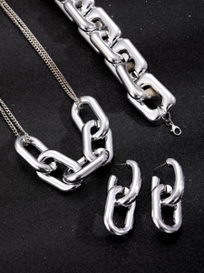 Conjunto de joyas de cadena industrial plateada con collar pulsera y pendientes