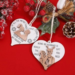 Christmas heart wooden ornaments with couple silhouettes and red festive decor